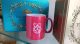 Kerámia bögre - Piros, Raspberry logóval, ajándék teával